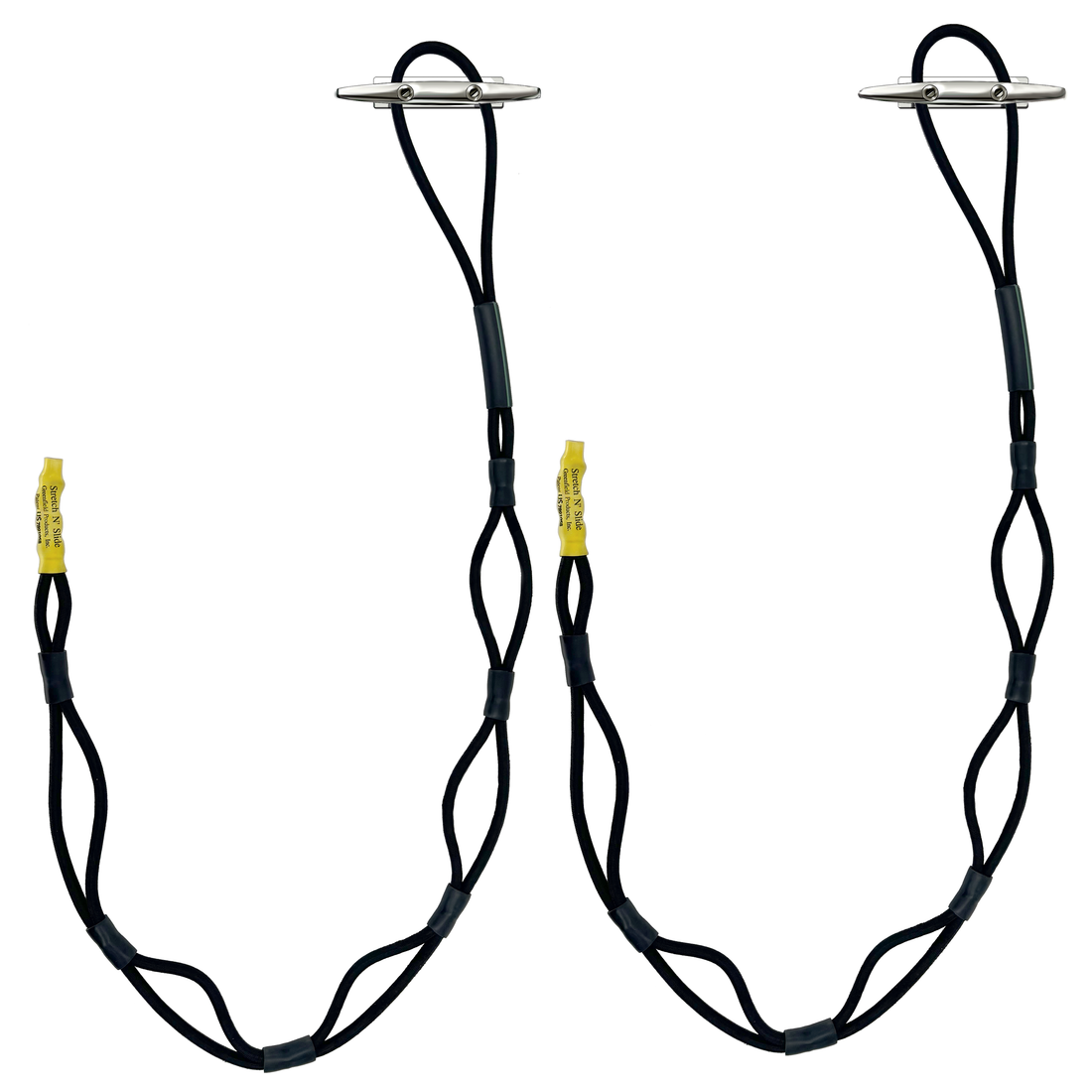 Bungee dock lines secured over stainless dock cleats at a dock